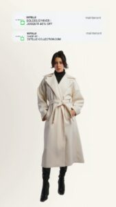 Manteau d'hiver beige avec ceinture porté par un modèle en position debout sur fond clair.